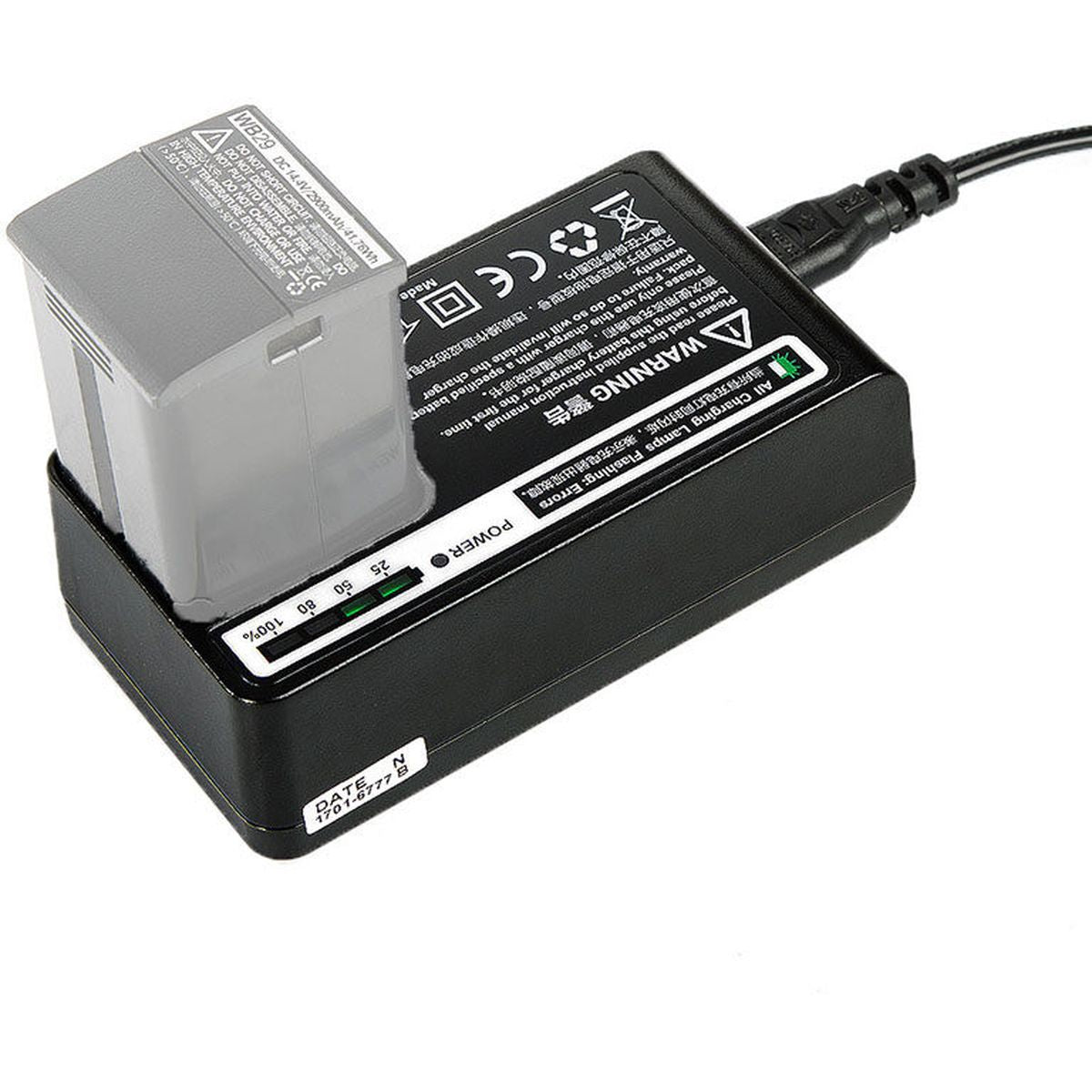 Chargeur Godox C29 de trois quarts, témoins de charge 25 à 100 % et batterie WB29 insérée