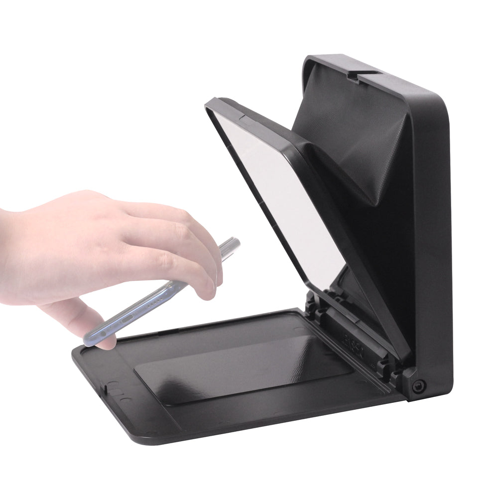 Téléprompteur Lensgo TC7 en cours de pliage, verre rabattu et smartphone posé à plat