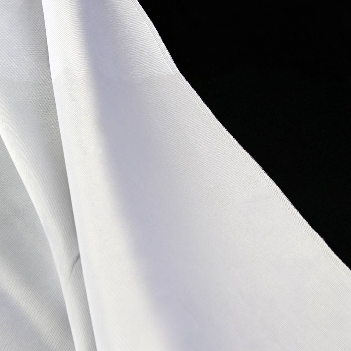 Toile de fond photo réversible StudioKing 2,7 x 5 m, pli de la face blanche sur la face noire