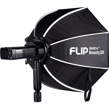 Adaptateur flash SMDV pour Speedbox-Flip monté entre un flash Godox et une softbox Flip Beauty 20 sur pied 