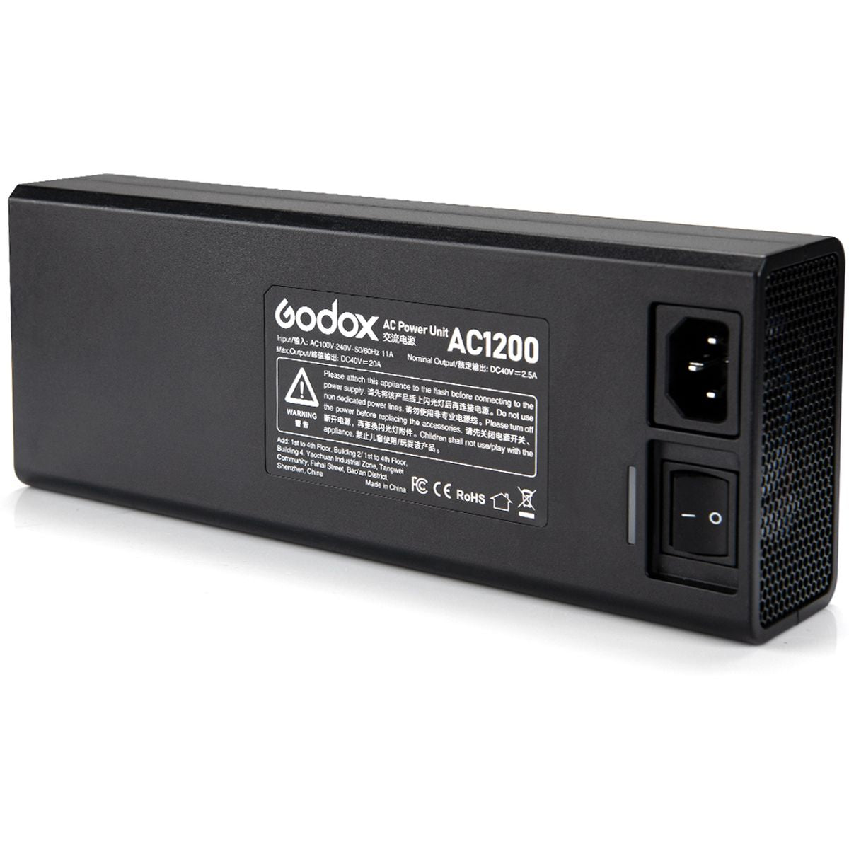 Adaptateur secteur Godox AC1200 de face, étiquette, prise IEC et interrupteur