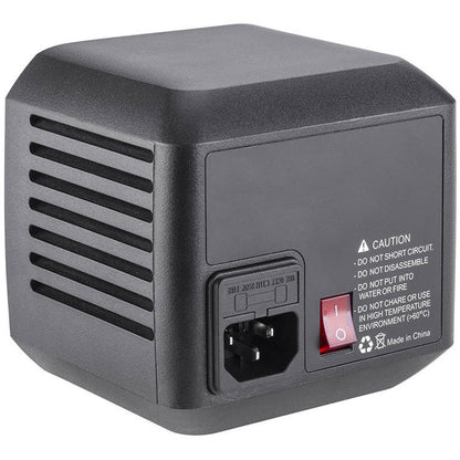 Adaptateur secteur Godox AD-AC de face, prise secteur, interrupteur rouge et consignes de sécurité