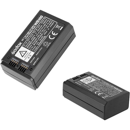 Deux batteries Godox WB100Pro présentées sous deux angles, contacts et étiquette