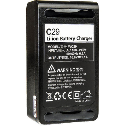 Dessous du chargeur Godox C29, étiquette entrée 100-240 V et sortie 16,8 V 1,1 A